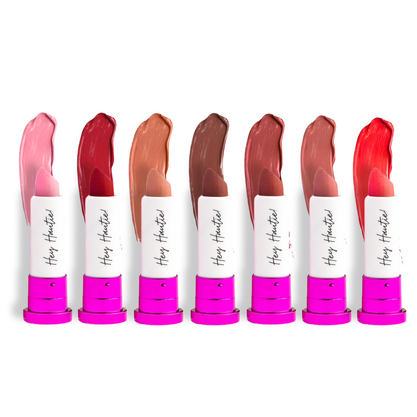 Set of lipsticks with pink and white caps on a white background